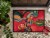 Carolines Treasures  6043MAT Red Flowers and berries Indoor or Outdoor Mat 18x27 Perspective: top