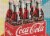 MasterPieces Coca-Cola® Mosaic Bottles Jigsaw Puzzle Perspective: top
