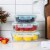 WHOLE HOUSEWARES | Glass Food Storage Containers Meal Prep, 3 Sizes | Airtight Lids . Perspective: top