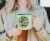 Jurassic Park Ranger Ceramic Camper Mug | Holds 20 Ounces Perspective: top