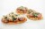 Home Chef Meal Kit Mini Pesto Pork Pizzas with Mozzarella Perspective: top