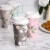 48 Pack Vintage Floral Paper Insulated Coffee Cups with Lids, 4 Designs, 16 Ounces Perspective: top