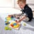 HABA Arranging Game Magical Pyramids - 36 Triangular Wooden Tiles with Templates Perspective: top