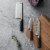 BergHOFF Essentials Stainless Steel Perforated Santoku Knife Perspective: top